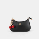 Coach Teri Shoulder Bag with distinctive cherry charms and a matching detachable pouch. (Premium Model)