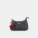 Coach Teri Shoulder Bag with distinctive cherry charms and a matching detachable pouch. (Premium Model)