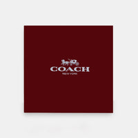 Coach-inspired signature crescent shoulder bag