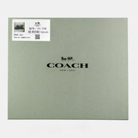 Coach Teri Shoulder Bag with distinctive cherry charms and a matching detachable pouch. (Premium Model)
