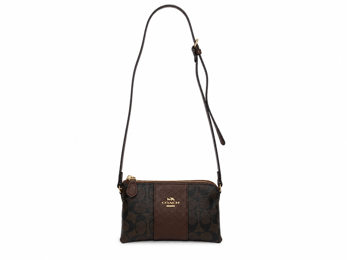 COACH Corner Zip Wristlet In Signature Canvas
