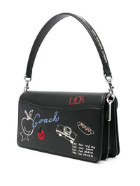 C - Tabby shoulder bag features a playful sketch print