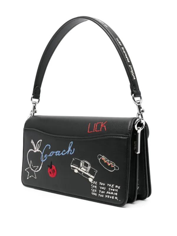 C - Tabby shoulder bag features a playful sketch print