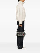 C - Tabby shoulder bag features a playful sketch print